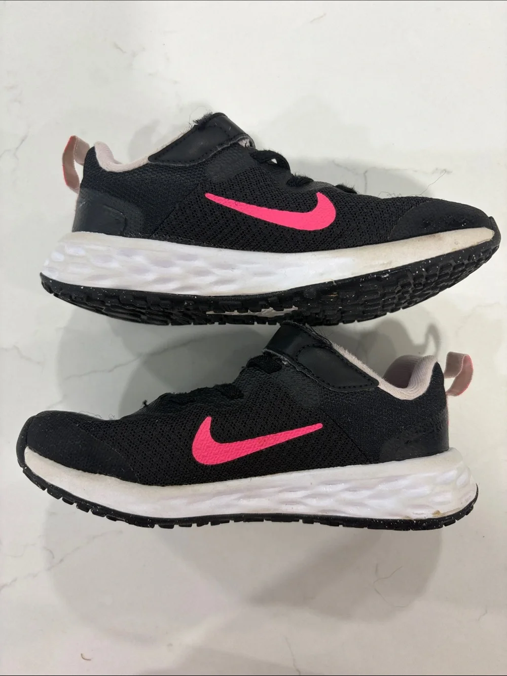 Nike Kids Black Sneakers with Pink Swoosh